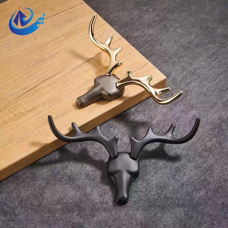 ما الذي يجعل التصميم الحديث مزخرف الجدار هو السنانير ملحقات المنزل الأساسية؟